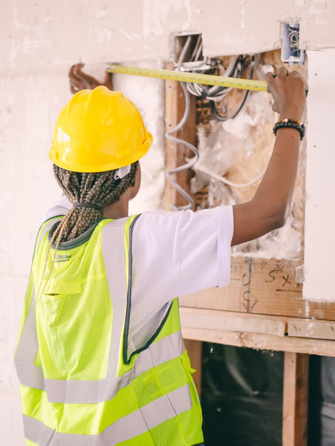 estimator measuring damaged interior finishes